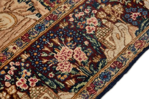 Close-up detail of 1960s Kerman rug from Iran / Persia showing Wool weave
