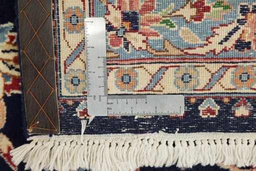 Close-up detail of 1960s Kerman rug from Iran / Persia showing Wool weave