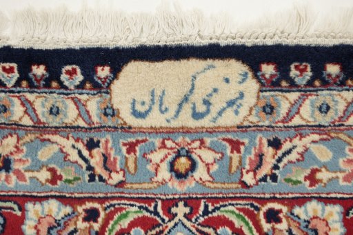 Close-up detail of 1960s Kerman rug from Iran / Persia showing Wool weave