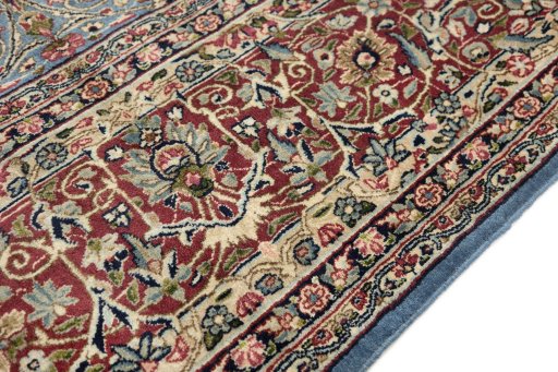 Full view of 1960s Kerman rug from Iran / Persia, 445 × 300 cm in Blue tones
