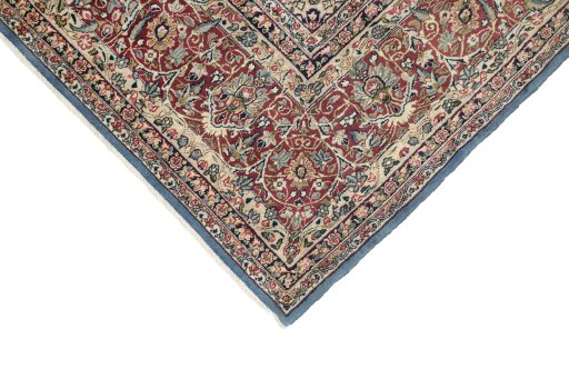 Backside of handmade 1960s Kerman rug showing knot structure and weave density