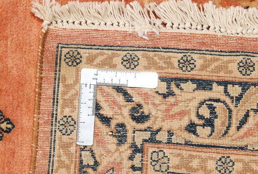 Close-up detail of 1940s Kerman rug from Iran / Persia showing Wool weave