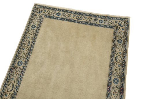 Surface texture of 1930s Kerman rug with natural Wool and intricate pattern