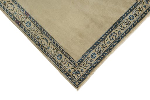 Backside of handmade 1930s Kerman rug showing knot structure and weave density