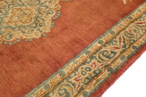 Backside of handmade 1950s Kerman rug showing knot structure and weave density