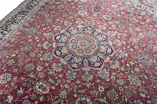 Backside of handmade 2000s Kerman rug showing knot structure and weave density