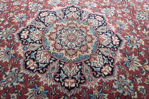 Central medallion detail of 2000s Kerman rug from Iran / Persia