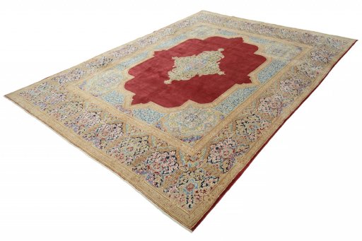 Corner detail of 2000s Kerman rug showing border pattern and Wool pile