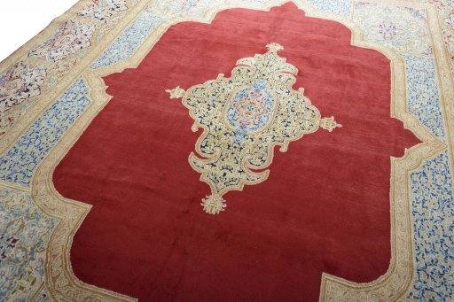 Backside of handmade 2000s Kerman rug showing knot structure and weave density
