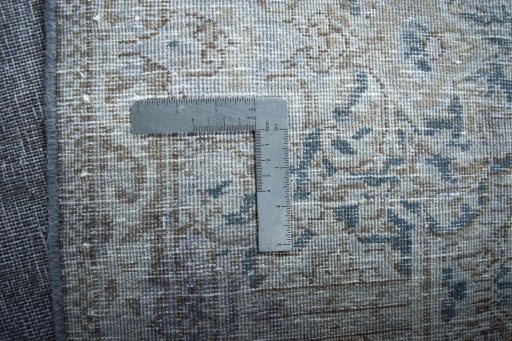 Backside of handmade 1970s Kerman rug showing knot structure and weave density