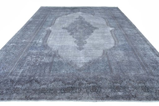 Surface texture of 1970s Kerman rug with natural Wool and intricate pattern