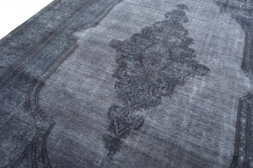 Backside of handmade 1970s Kerman rug showing knot structure and weave density