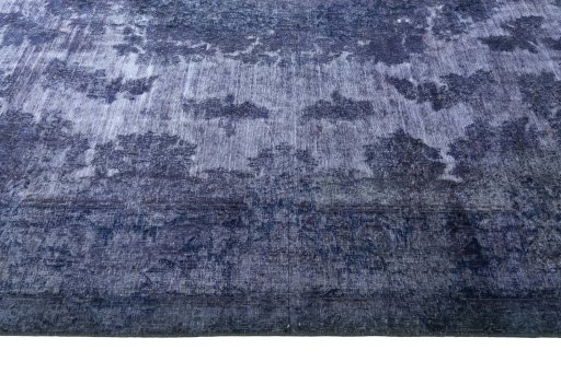 Corner detail of 1970s Kerman rug showing border pattern and Wool pile