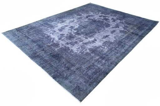 Corner detail of 1970s Kerman rug showing border pattern and Wool pile