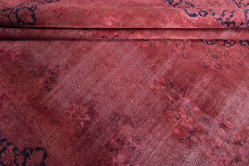 Close-up detail of 1970s Kerman rug from Iran / Persia showing Wool weave