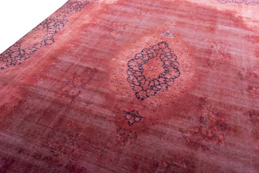 Backside of handmade 1970s Kerman rug showing knot structure and weave density