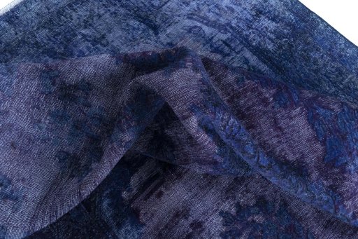 Surface texture of 1970s Kerman rug with natural Wool and intricate pattern