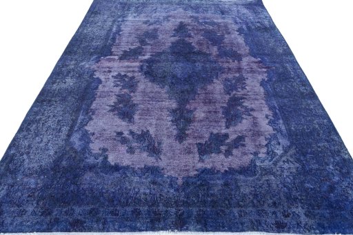 Surface texture of 1970s Kerman rug with natural Wool and intricate pattern