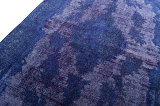 Backside of handmade 1970s Kerman rug showing knot structure and weave density