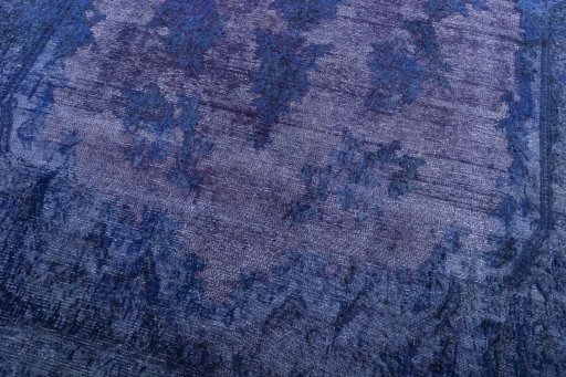 Close-up detail of 1970s Kerman rug from Iran / Persia showing Wool weave