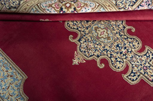 Close-up detail of 2000s Kerman rug from Iran / Persia showing Wool weave