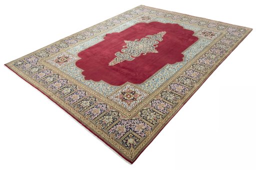 Corner detail of 2000s Kerman rug showing border pattern and Wool pile