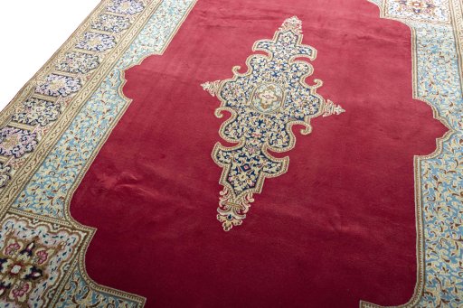 Backside of handmade 2000s Kerman rug showing knot structure and weave density