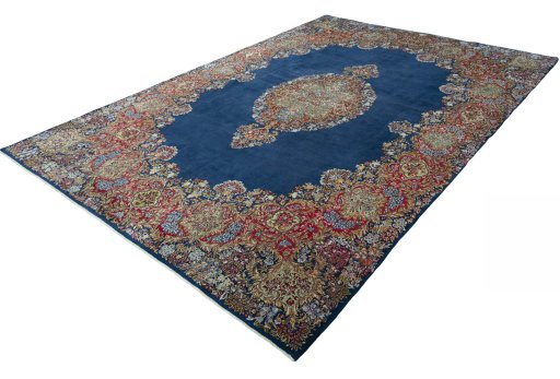 Corner detail of 1970s Kerman rug showing border pattern and Wool pile