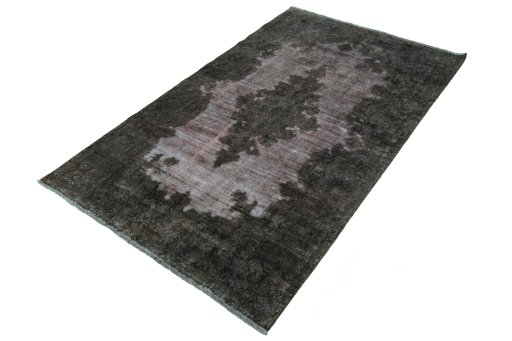 Corner detail of 1950s Kerman rug showing border pattern and Wool pile