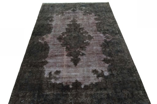 Surface texture of 1950s Kerman rug with natural Wool and intricate pattern