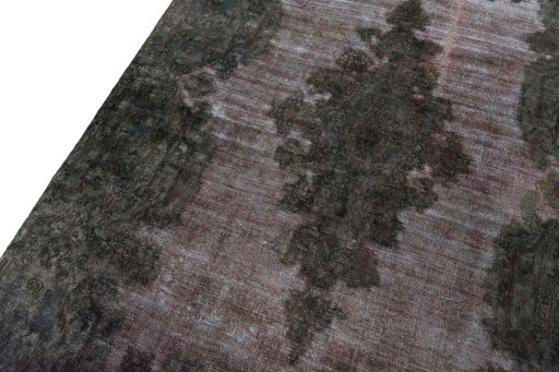 Backside of handmade 1950s Kerman rug showing knot structure and weave density