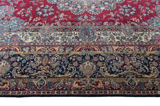 Corner detail of 1950s Kerman rug showing border pattern and Wool pile
