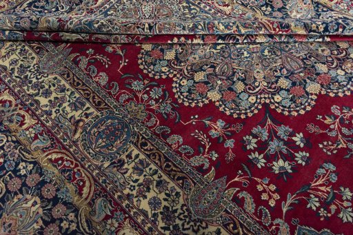 Close-up detail of 1950s Kerman rug from Iran / Persia showing Wool weave