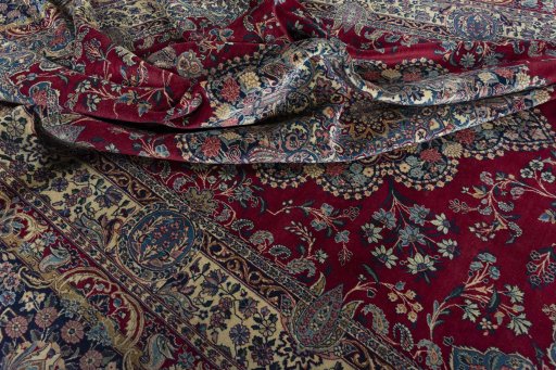 Surface texture of 1950s Kerman rug with natural Wool and intricate pattern