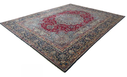 Corner detail of 1950s Kerman rug showing border pattern and Wool pile