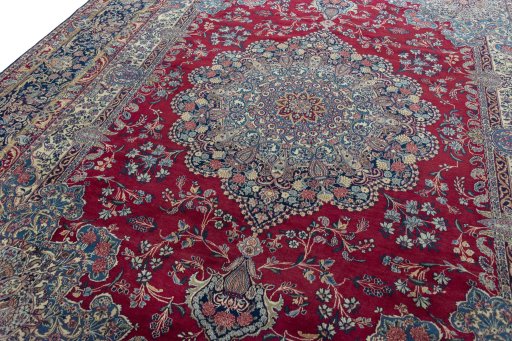 Backside of handmade 1950s Kerman rug showing knot structure and weave density