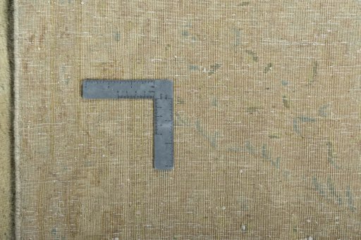 Backside of handmade 1950s Kerman rug showing knot structure and weave density