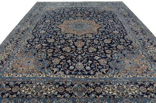 Surface texture of 2000s Kerman rug with natural Wool and intricate pattern