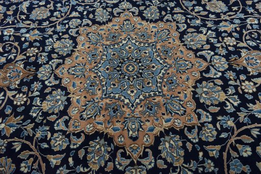 Central medallion detail of 2000s Kerman rug from Iran / Persia