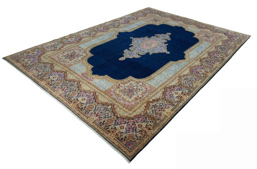 Corner detail of 1970s Kerman rug showing border pattern and Wool pile