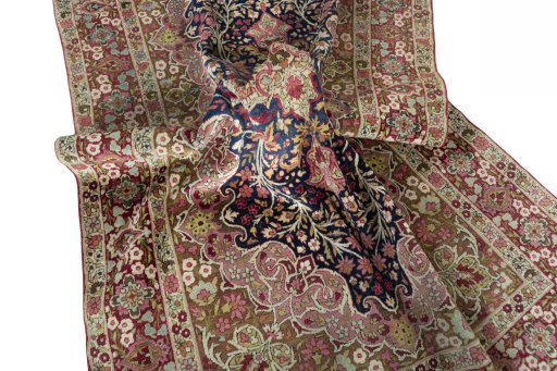 Close-up detail of 1930s Kerman rug from Iran / Persia showing Wool weave
