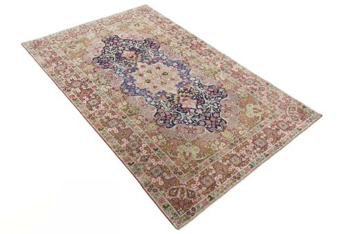 Close-up detail of 1930s Kerman rug from Iran / Persia showing Wool weave
