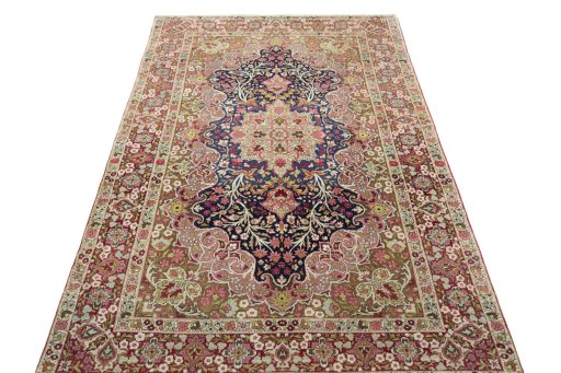 Surface texture of 1930s Kerman rug with natural Wool and intricate pattern
