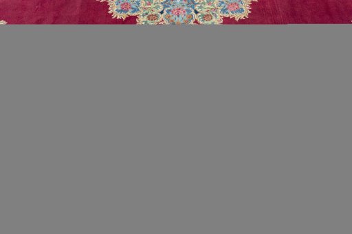 Corner detail of 1950s Kerman rug showing border pattern and Wool pile
