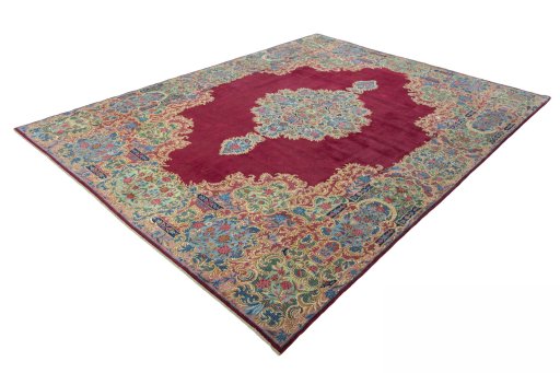 Corner detail of 1950s Kerman rug showing border pattern and Wool pile