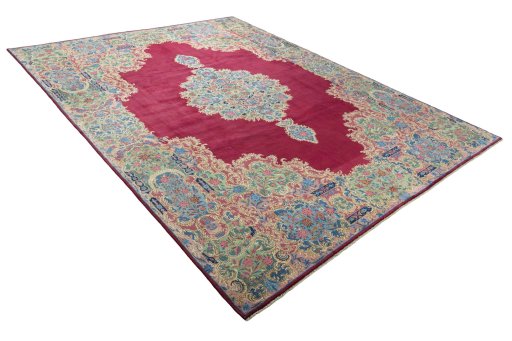 Close-up detail of 1950s Kerman rug from Iran / Persia showing Wool weave