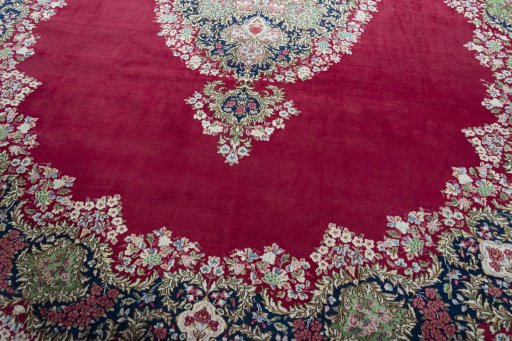 Close-up detail of 1970s Kerman rug from Iran / Persia showing Wool weave