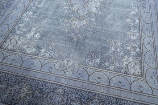 Close-up detail of 1970s Kerman rug from Iran / Persia showing Wool weave