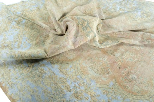 Surface texture of 1970s Kerman rug with natural Wool and intricate pattern