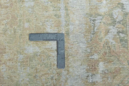 Backside of handmade 1970s Kerman rug showing knot structure and weave density